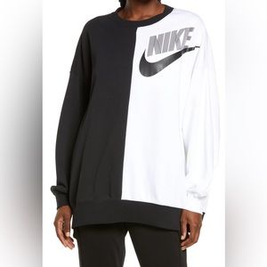 Bold colorblocking bisects a sweatshirt made of cotton-blend fleece.